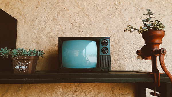 Old-fashioned tv on a shelf
